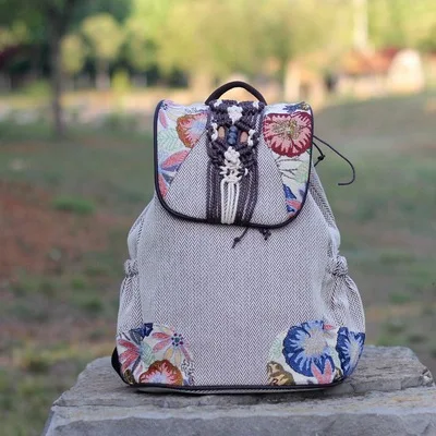 

Fashion national string appliques women shopping backpacks!Nice floral embossing lady cover backrack all-match canvas backruck