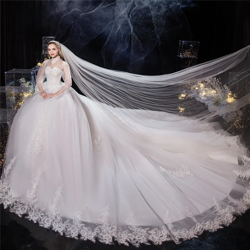 Роскошное кружевное свадебное платье с вышивкой винтажное высоким воротом и