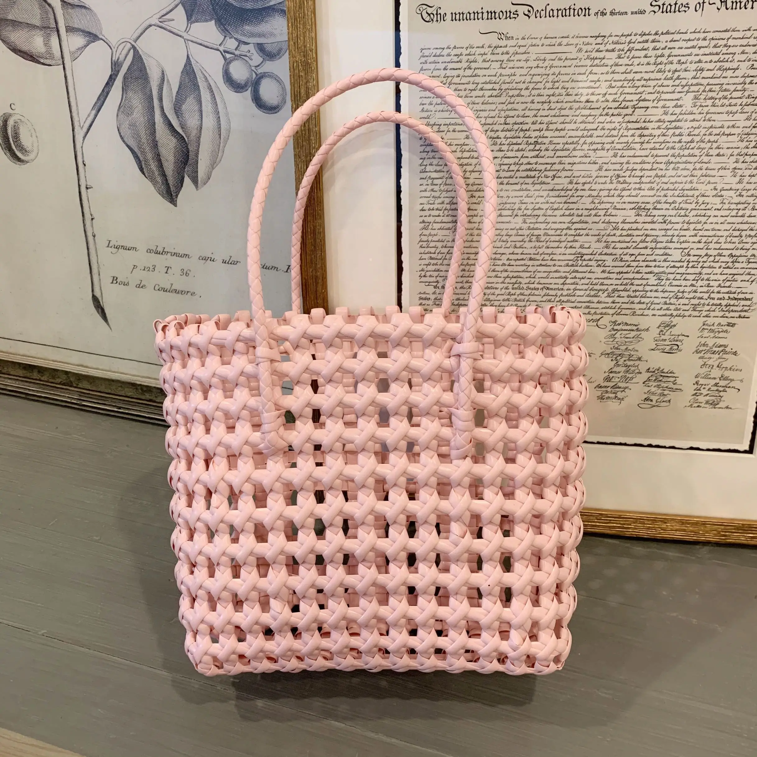 

Hand-woven hollow vegetable basket fashion hand-made straw bag to collect basket small women's bags