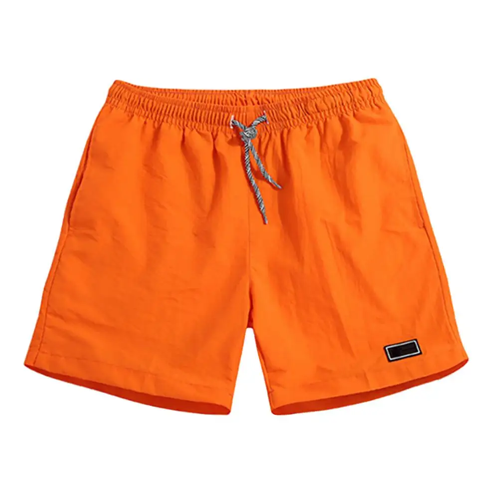

Men Casual Breathable Quick Dry Pants Pockets Beach Solid Color Sport Shorts