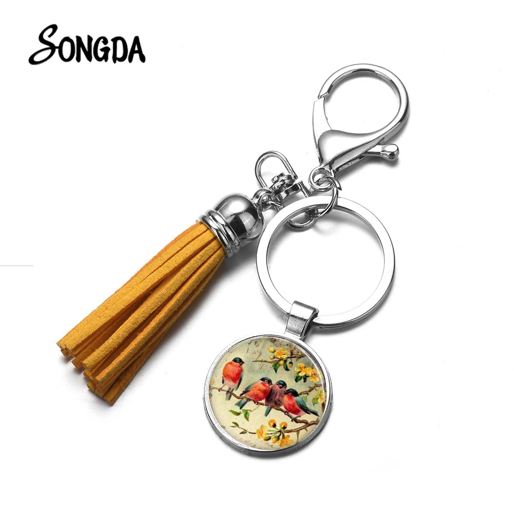 Птицы стоят на цветке Брелок ветвь очаровательные красочные Колибри