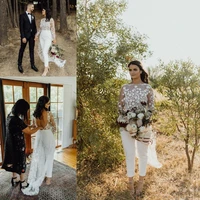 sexy backless jumpsuit wedding dresses with train 2021see through lace long sleeve bohemian wedding dress jewel neck bridal gown