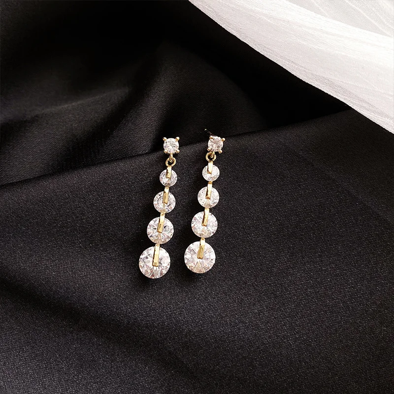 

925 Silver Needle Korea Simple Temperament Atmosphere Bright Zircon Streamline Face Slender Tassel Earrings