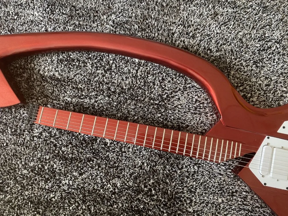 

Special shape electric guitar, metal electric guitar, red, headless, free delivery, factory direct sales