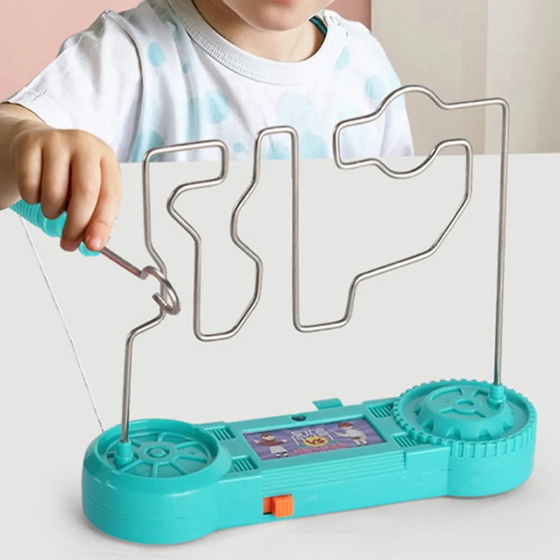 

Детская игрушка-лабиринт с электрошоком