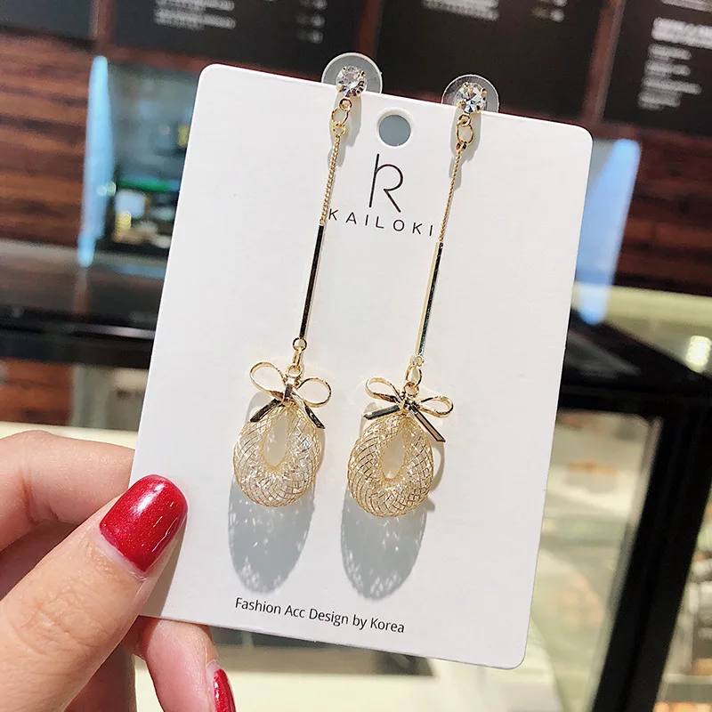 Корейский темперамент сетки с Сияющий бриллиант бант кулон длинные серьги