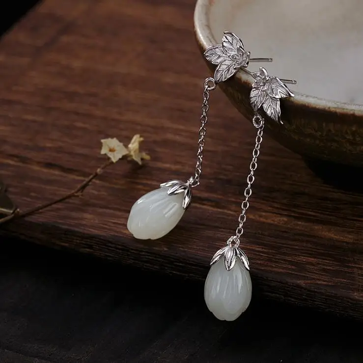 

Original design natural Hetian jade magnolia long earrings Chinese style retro elegant light luxury charm women's silver jewelry