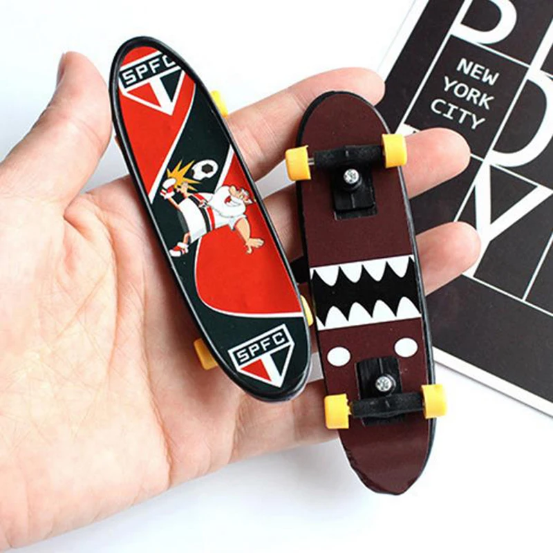 

Mini Plastic Skate Finger Skateboarding Fingerboard Novelty Gag Toys For Boys Children Skateboard Finger Board Gifts