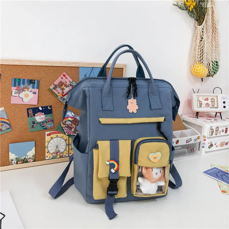 

Large capacity schoolbag female middle school student backpack Japanese small fresh girl color Harajuku INS travel backpack