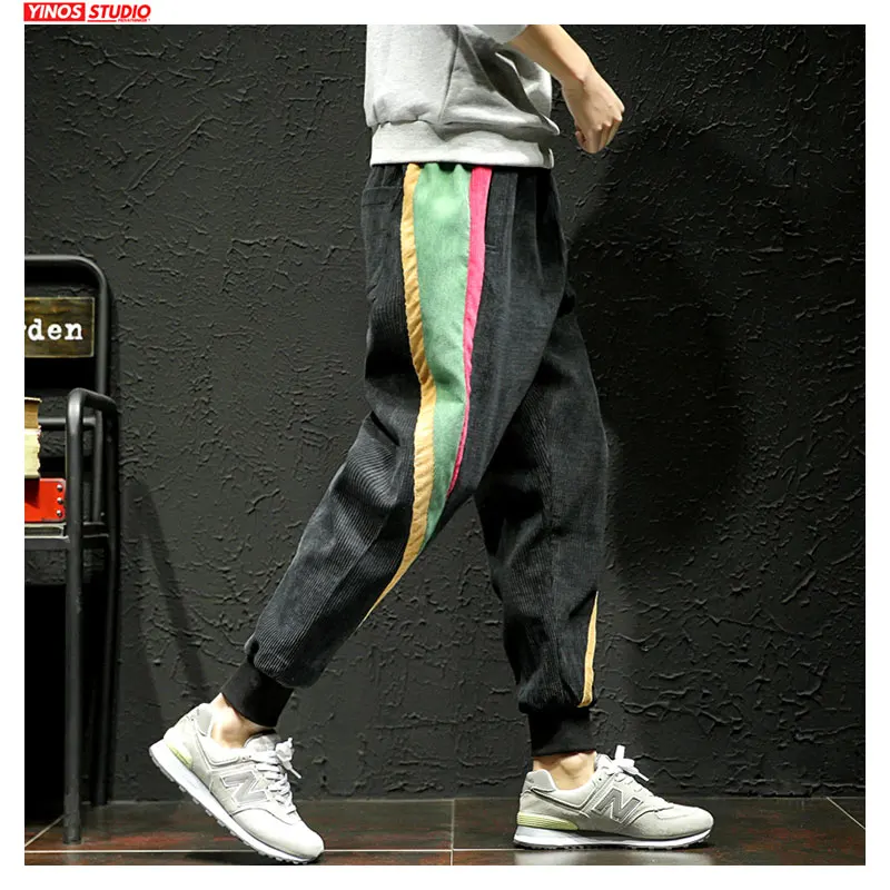 Мужские брюки шаровары с полосками сбоку повседневные черные бархатным