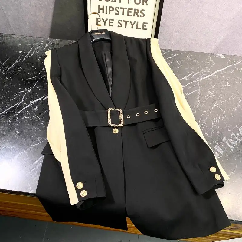 

New celebrity with the spring 2020 net yarn splicing sleeve designs a belted waist long sleeved suit jackets
