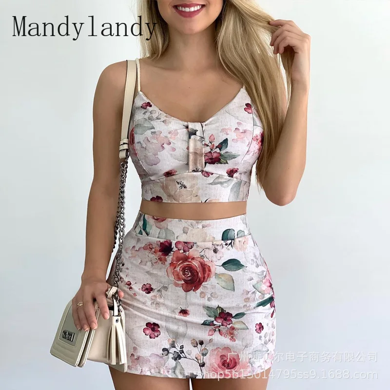 

Женский спортивный костюм Mandylandy, элегантный комплект из двух предметов с цветочным принтом, укороченный топ на бретелях и юбка с завышенной...