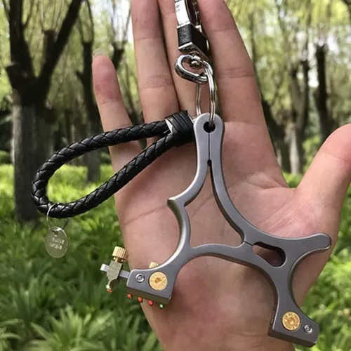 

Profession Outdoor Precise New Titanium Alloy Flat Rubber Band Slingshot Portable Sling Shot High Quality Tc21hunting Catapult