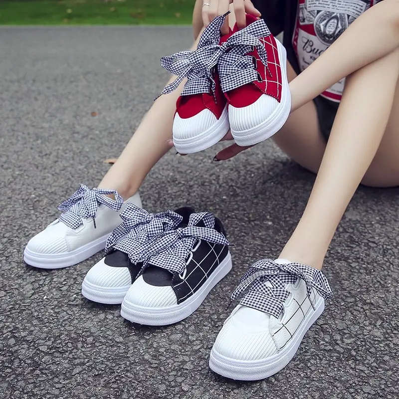 

Black shoes female 2021 spring new wild canvas shoes middle school students casual sports board shoes flat shoes
