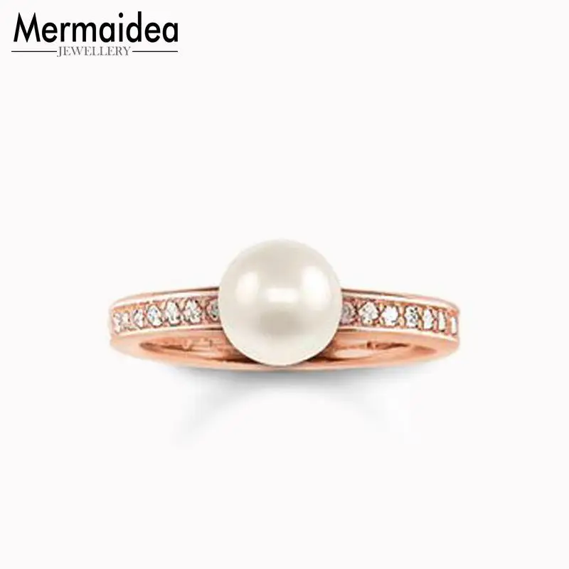 Кольца из розового золота с белым фианитом и жемчугом кольца высокого качества