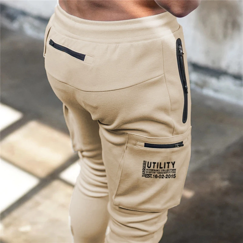 

Muscle fitness brand men's sports pants streetwear outdoor men's casual pants jogger trousers multi-pocket zipper overalls
