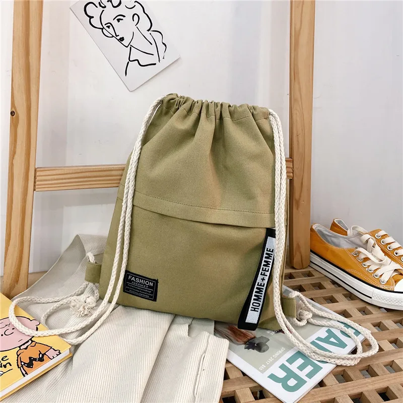 

Women Canvas Soft Simplicity Pocket Drawstring Bag Backpack Student Bag String Open Pocket Drawstring Outdoor Backpack