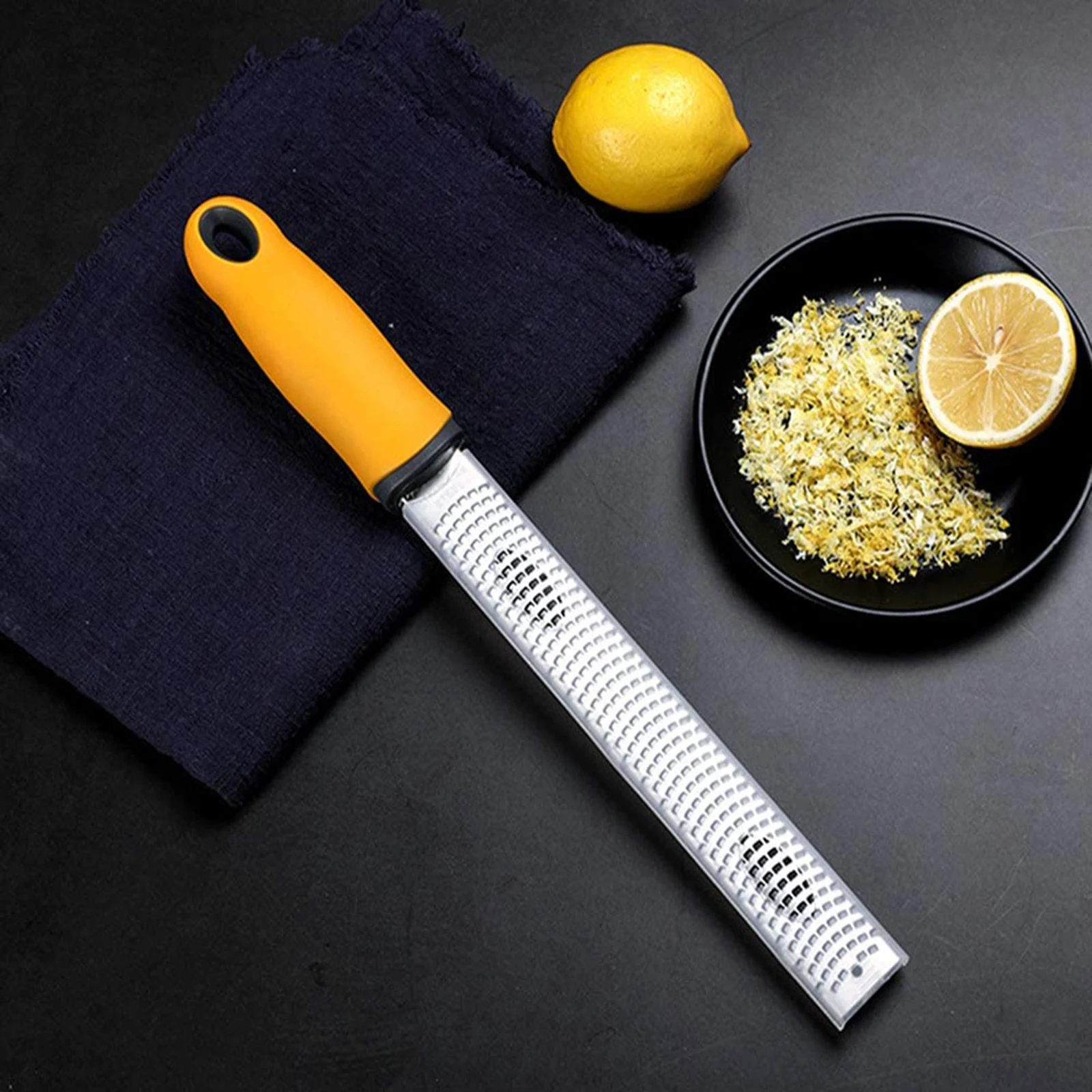 

Kitchen Grater with Non-slip Silicone Pad, Hanging Hole Stainless Steel Sharp Blade Slender Tool