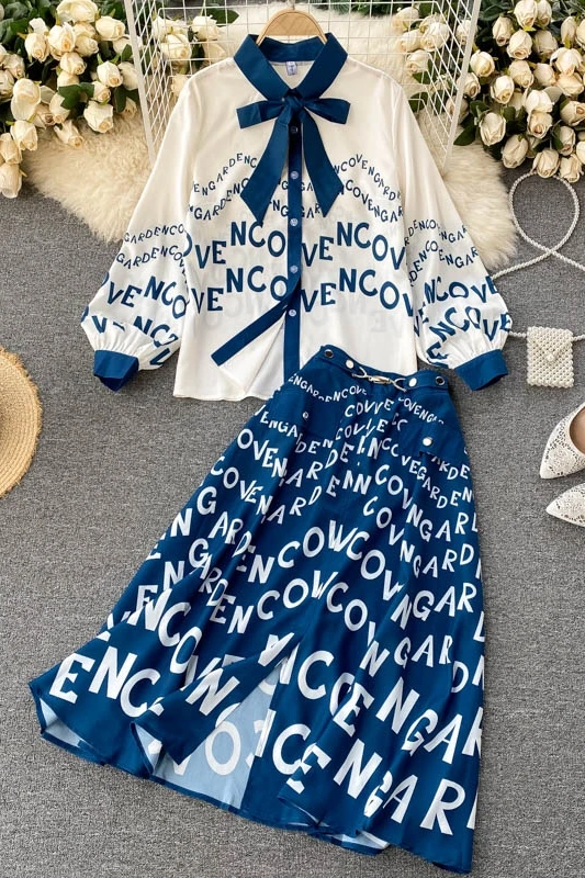 

Korean version of the spring and summer new personality letter bow puff sleeve shirt high waist slim skirt two-piece suit