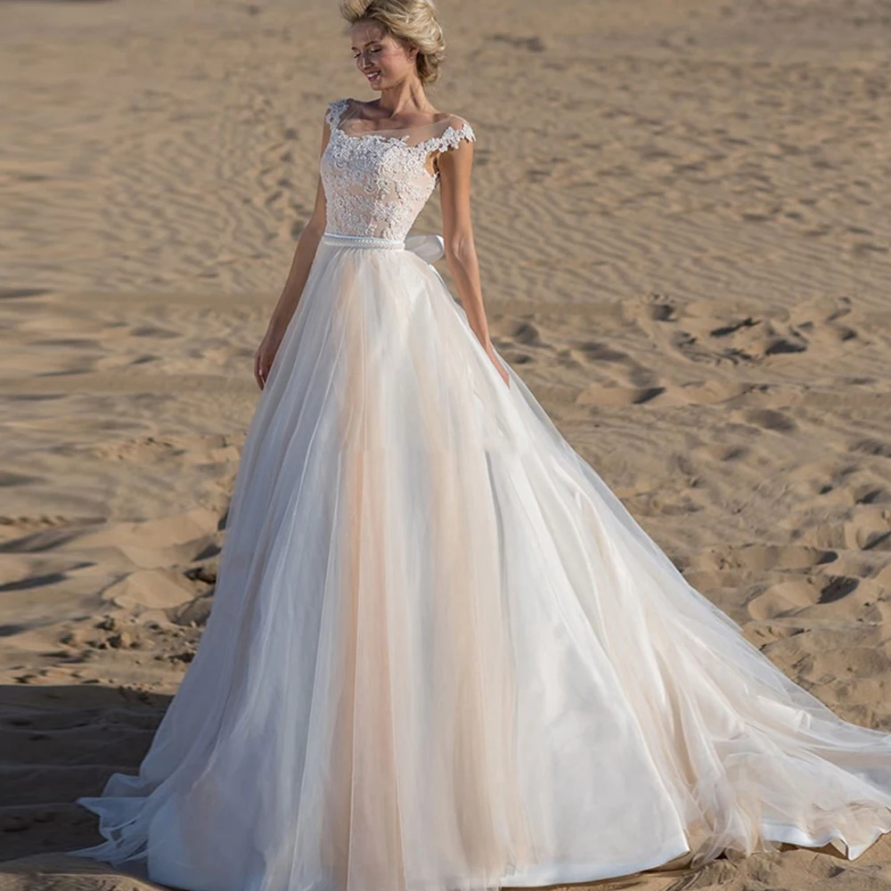 

Свадебные платья из тюля в стиле бохо, трапециевидные кружевные платья цвета шампанского с глубоким круглым декольте, рукавами-крылышками ...