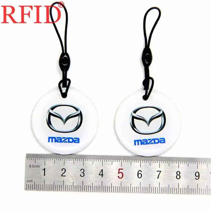 ID 125Khz EM4305 EM4205 Replicable Writable Auto Logos Pattern Keyfob RFID Card Circular Dropping Glue Keychain Access Control 1 |