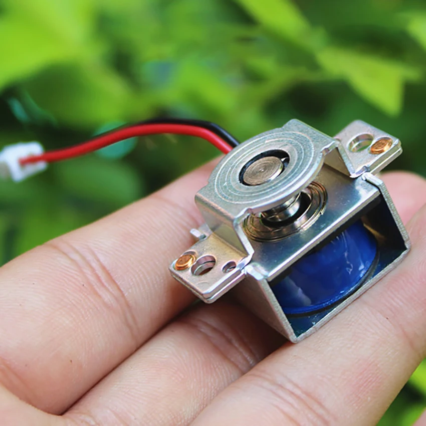 Миниатюрный электромагнит вдыхаемый через вытяжной микроэлектромагнит