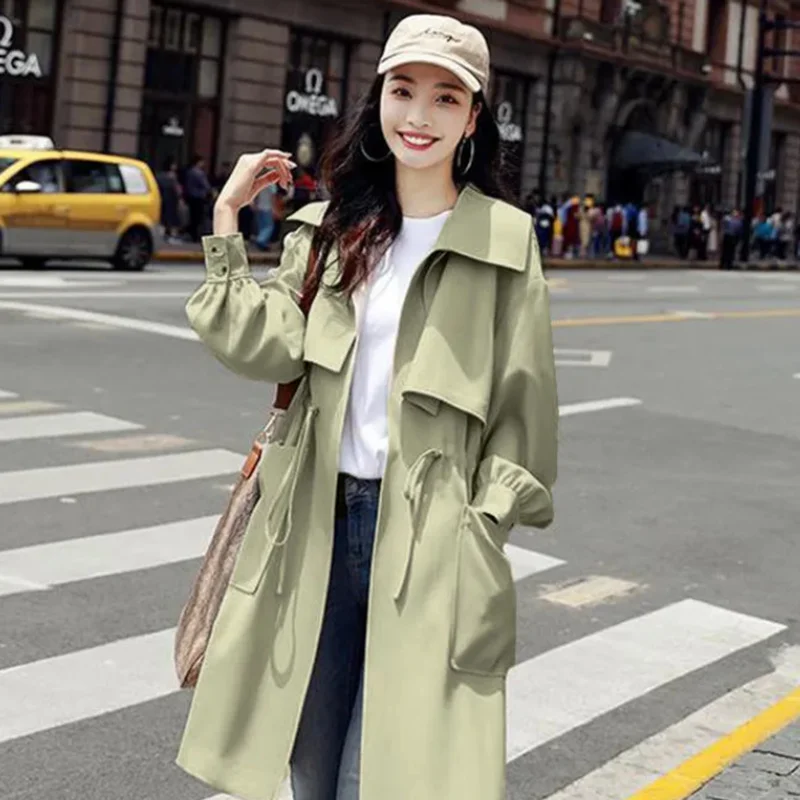 

Lining the spring and autumn new jacket fashion thin British style coat waist was thinner mid-length women's windbreaker 2021