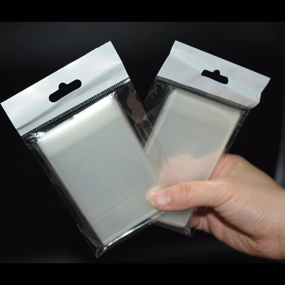100pcs/lot 57x87mm Quicksand Flash Small Cards Transparent Laser Clear Sleeves Idol Photo Protector Trading Shield Cover | Спорт и