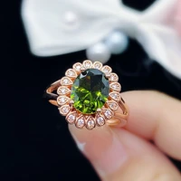 new fashion flower shaped temperament simulated olive green tourmaline color treasure adjustable ring for women elegance jewelry