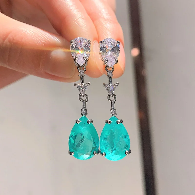 

Simulation Paraiba blue earrings female sterling silver needle drop-shaped artificial inlaid European and American simple temper