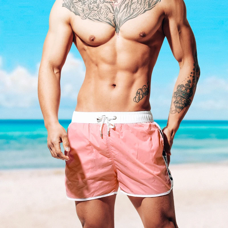 

D26 solid men beach shorts breathable vacation swimming shorts new summer sexy swimwear gym sports surf bikini swimsuit shorts