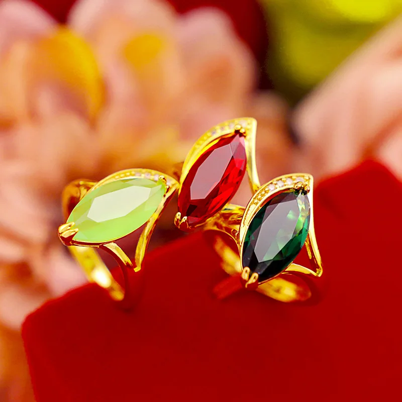 Женское золотое кольцо с изумрудами регулируемое из 14-каратного желтого золота