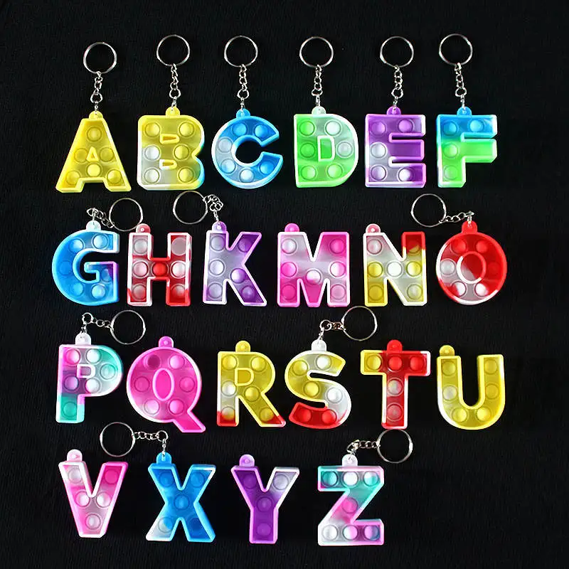 

1pcs Mini Push Bubble letter Shaped Sensory Toy Autism Needs Squishy Stress Reliever Toys Anti-stress Fidget Keychain Kids Gift