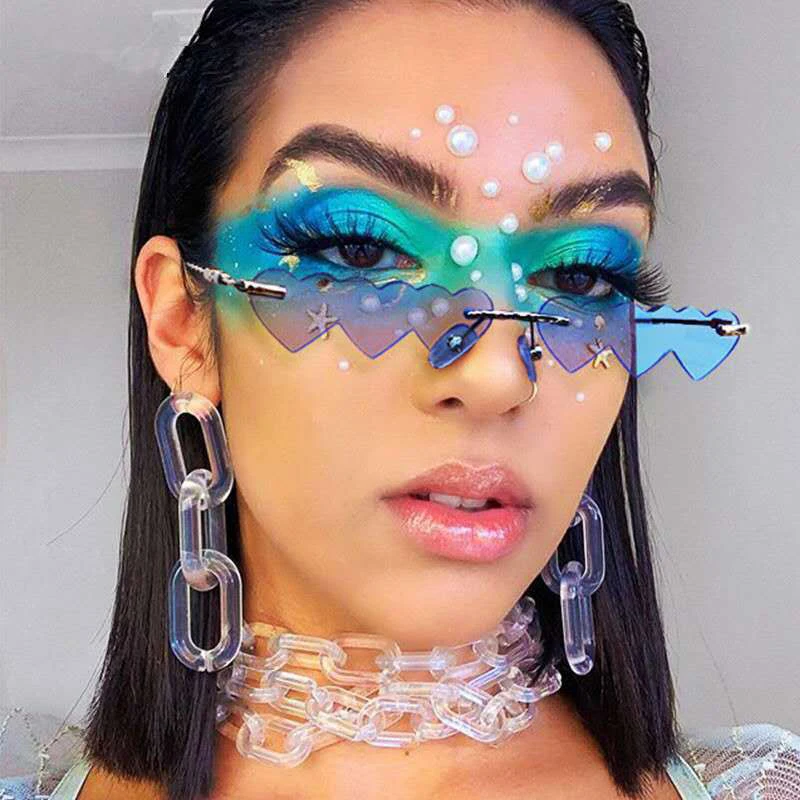 

Новинка трендовые солнцезащитные очки в маленькой оправе цельные маленькие персиковые солнцезащитные очки в форме сердца для уличной съем...