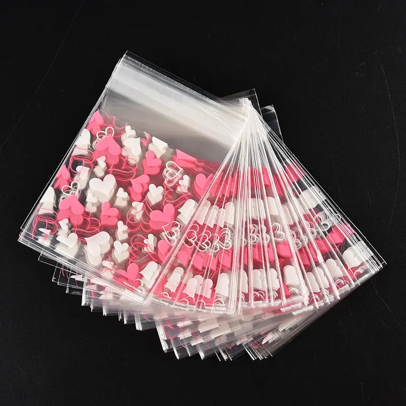 

100PCS Cute Heart Transparent Cookies Candies Bag Self-adhesive Christmas Food bake Gift Packaging Bags Stationery Holder