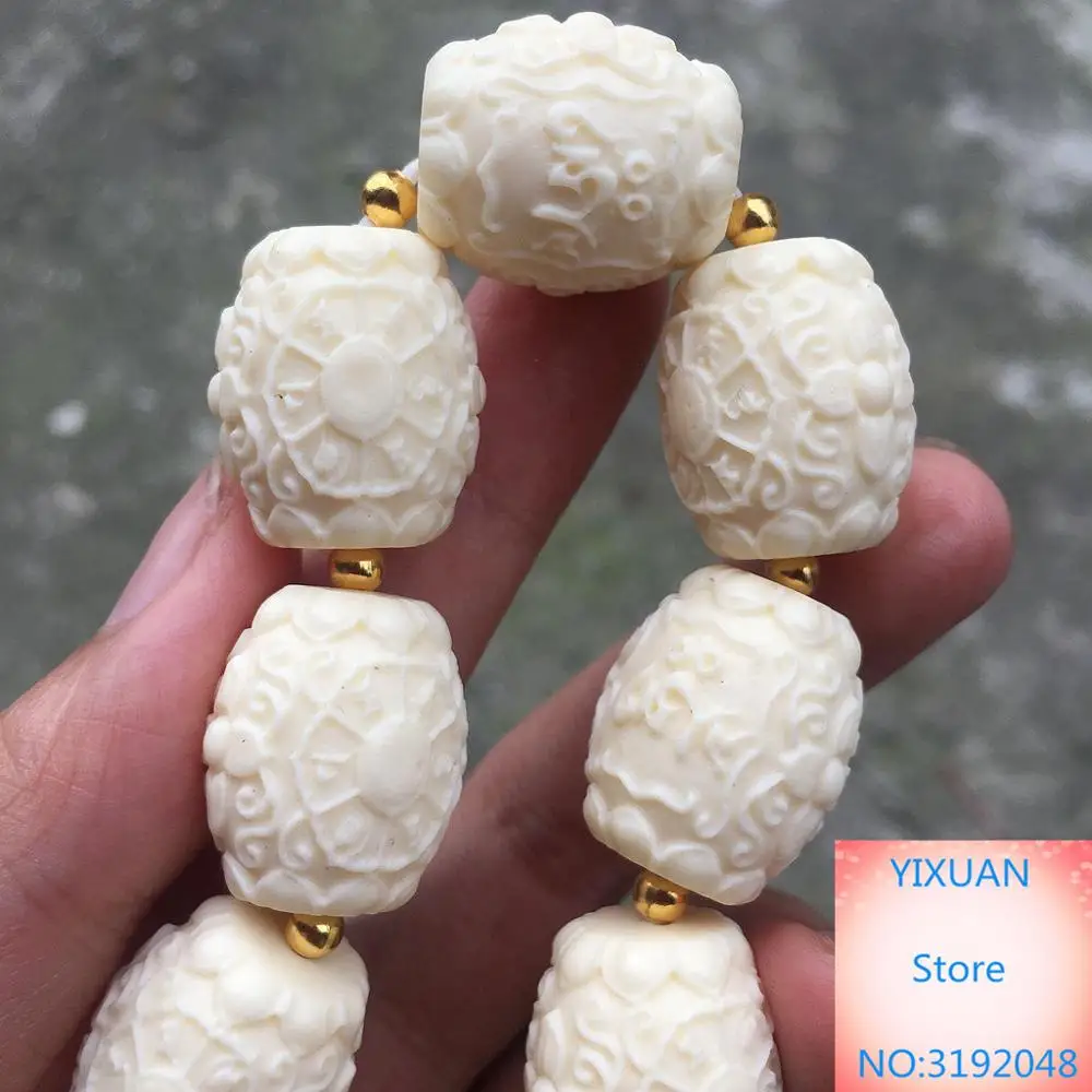 Резьба по слоновой кости ладони лотоса бергамота струны мужской и женский