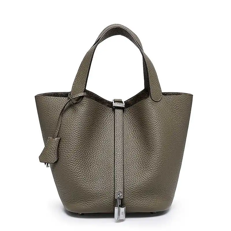 

Bag women's bag new 2021 Korean minority lychee grain head Kraft vegetable basket bag leather portable bucket bag