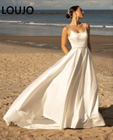 luojo spaghetti strap satin wedding dresses elegant with pockets white bridal dress crystal decor sweep wedding gown