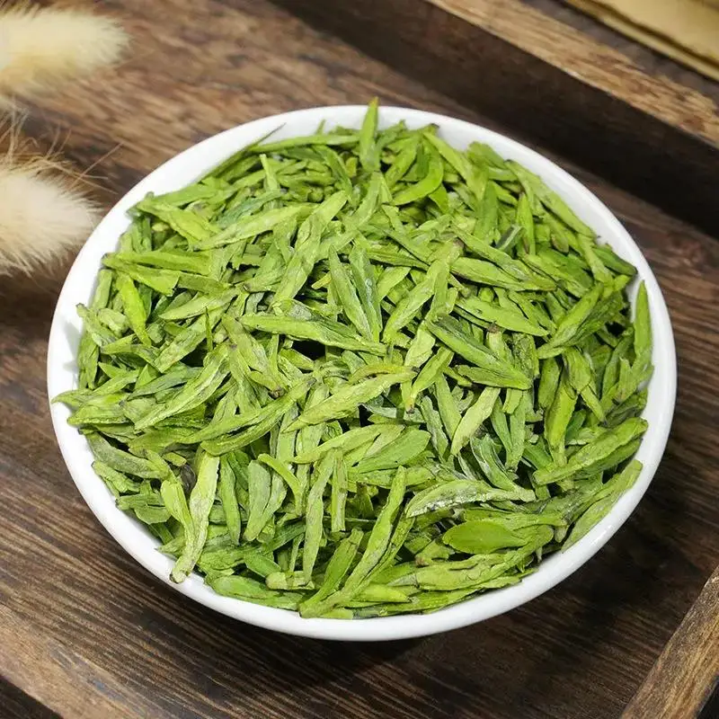 

Оригинальный китайский чай, новый чай с высокой горой, чай longjing, чай из Западного озера longjing, зеленый чай longjing, чай xihu longjing, чай Лонгин