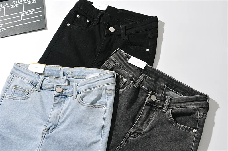 Женские рваные джинсовые шорты однотонные Асимметричные эластичные с высокой