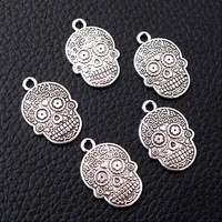 10pcslot silver plated charms metal jacquard skull pendants diy necklace earrings handmade jewelry accessories 2315mm p111