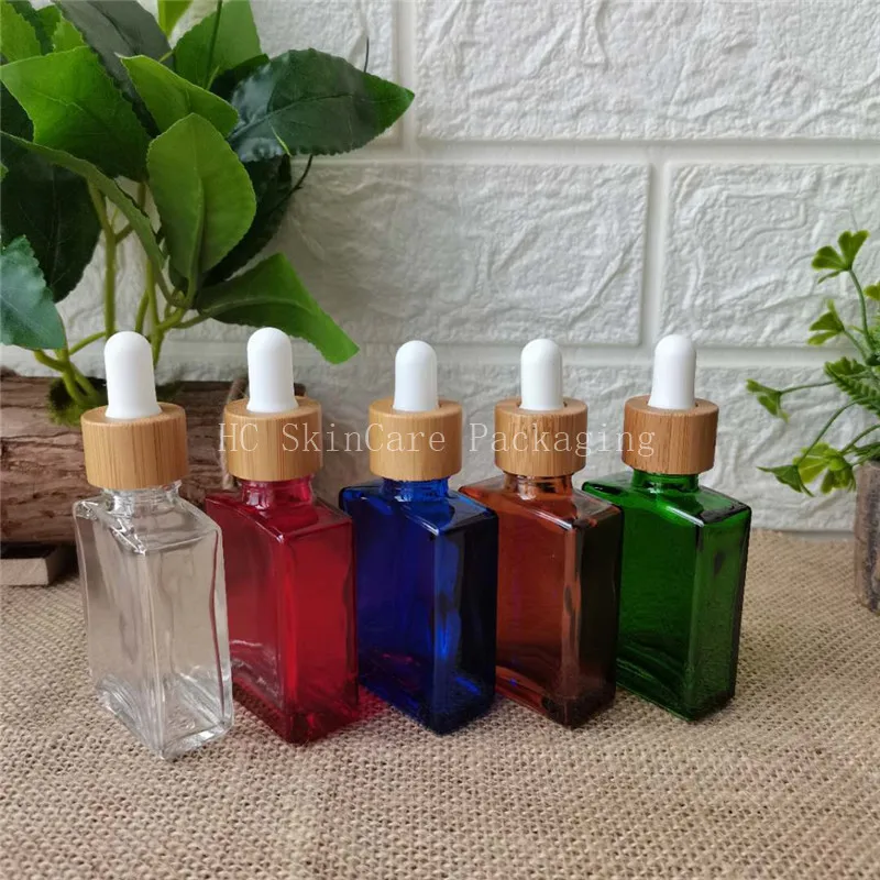 

High Qualitly Portable Colourful Essential Oil Liquid bottle with rubber top cap 30ML Cosmetic Travel bottles