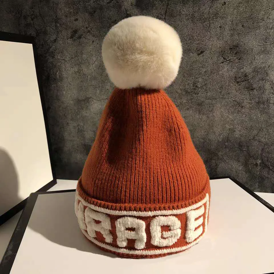 Obsessed with lavender.Hat female autumn/winter letter wool hat black knit hat Korean Japanese cute tide brand ball to keep warm