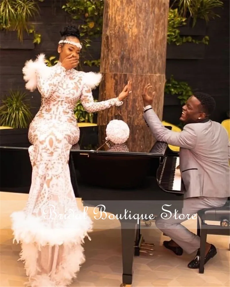 High Neck Mermaid Prom Dresses 2021 New White Long Sleeve Lace Beaded Formal Evening Dress with Feathers