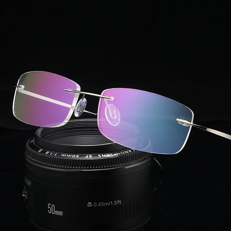 

Очки для чтения без оправы из титанового сплава с защитой от сисветильник, очки для чтения в прямоугольной оправе для мужчин и женщин, эласт...