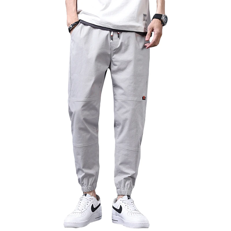 

2021 spring and summer men's casual pants Korean version of the trendy sports overalls harem pants with loose feet