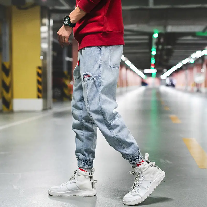 

Summer men's ripped jeans Korean version of the trend of self-cultivation small feet harem pants tied ankle nine points beggar p