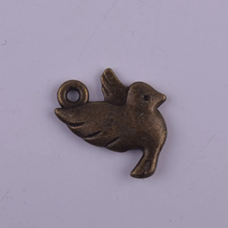 

Оптовая продажа, кулон в виде птицы, Ретро стиль, бронзовый тон, кожаная цепочка, ожерелье, подвеска, сплав, ювелирные аксессуары, 50 шт./лот: