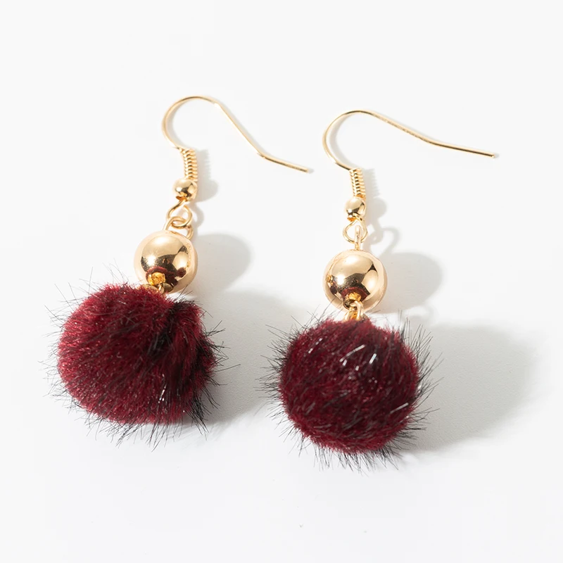 

Korean version of the new earrings cute sweet metal ball tassels autumn and winter long paragraph pompom fashion girls jewelry