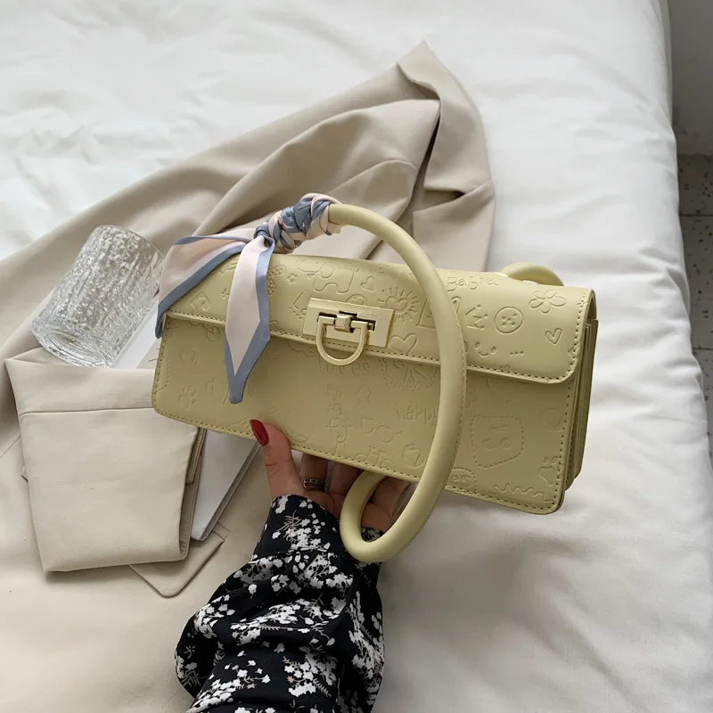 

The niche design texture handbag. 2021 new tide summer fashion shoulder baguette. online celebrity high sense crossbody bag.